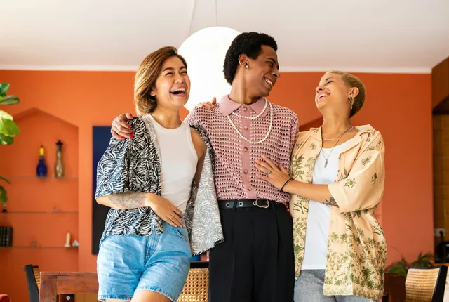Group of friends bonding at home, LGBTQ and diversity concepts