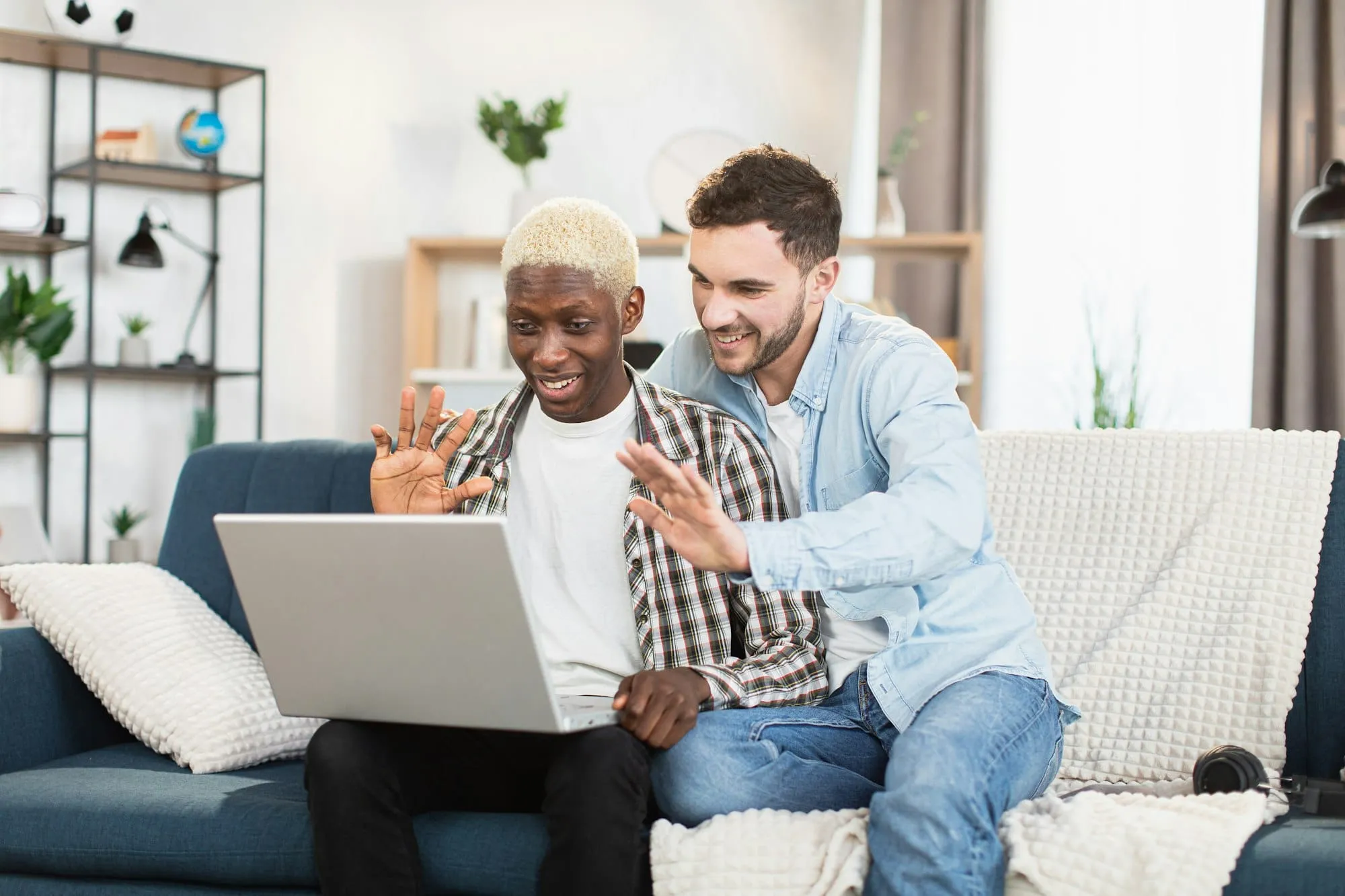 A couple using a laptop for a video chat
